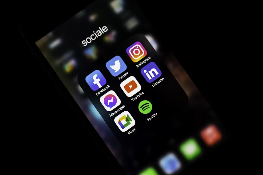 A person browsing a personalized social media feed on a smartphone based on previous interactions.